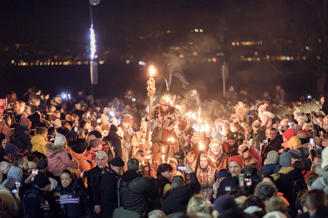 Torchlight parade of the Fabuleux Village des Flottins by the lake, Évian