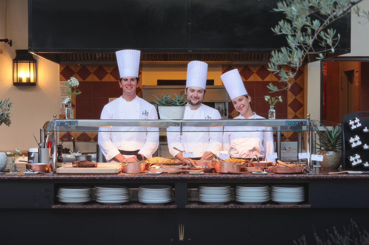 Chefs behind an evening buffet