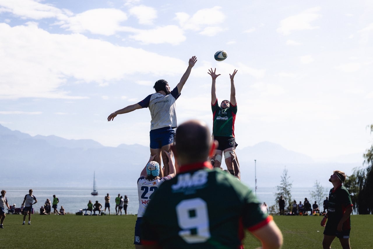A lineout during a rugby match in Lausanne, by Lake Geneva